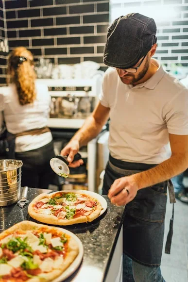 Students preparing pizza